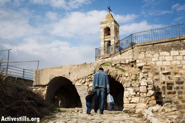 Church of Our Lady in Bir'em. Believers removed grafiti from its walls (Oren Ziv / Activestills)