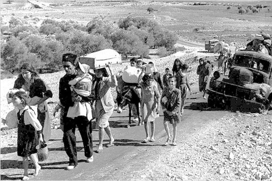 Palestinian refugees 'making their way from Galilee in October-November 1948' (Fred Csasznik, copyright expired)
