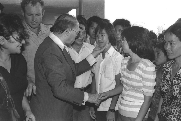 Prime Minister Menachem Begin visits Vietnamese refugees who were absorbed in Afula, Israel, June 25, 1980. (Photo: Herman Chanania/GPO)