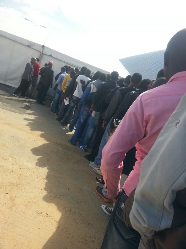 The line for our allowance, March 15, 2014. (Ahmad)