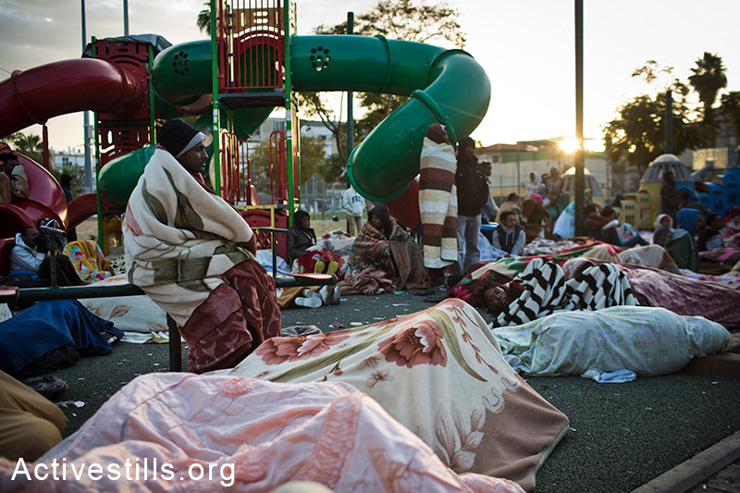 African asylum seekers wake up in Levinsky Park, South Tel Aviv, on the second day of sit-in, February 3, 2013. (photo: Oren Ziv/Activestills.org)