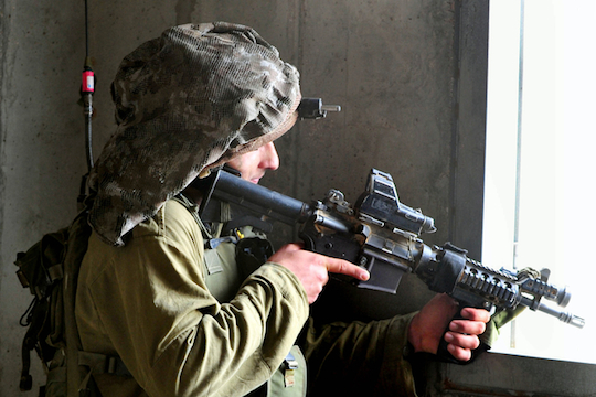 Illustrative photo of an IDF sharpshooter aiming his weapon (Photo by ChameleonsEye / Shutterstock.com)