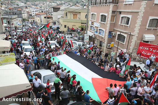Palestinians from the Galilee town of Sakhnin commemorating Land Day, March 30, 2013. (Photo by: Yotam Ronen/Activestills.org)