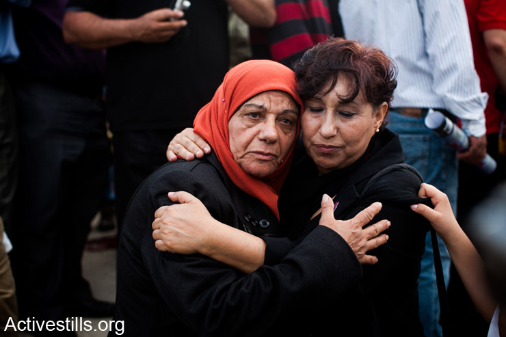 Layla, mother of the hunger striking Palestinian prisoner Samer Issawi, is seen in the Galilee town of Sakhnin, during the Land Day demonstration, March 30, 2013. Land Day commemorates the death of six Palestinian protesters at the hands of Israeli forces during mass demonstrations in 1976 against plans to confiscate Palestinian land in northern Israel.