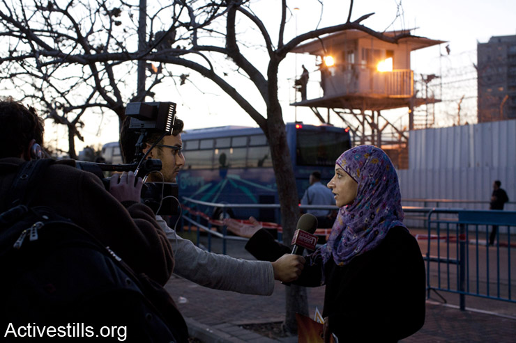 Shireen Issawi, the sister of Palestinian hunger striker Samer Issawi, being interviewed during a demonstration in front of Ramle prison in solidarity with Palestinian prisoner Samer Issawi. Issawi has been on hunger strike for 194 days and is currently held in an Israeli medical detention center in critical condition.