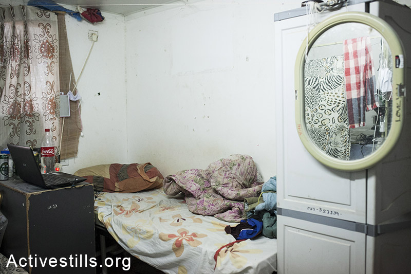 The small rooms of 3-4 meters contains up to three beds. (Activestills.org)