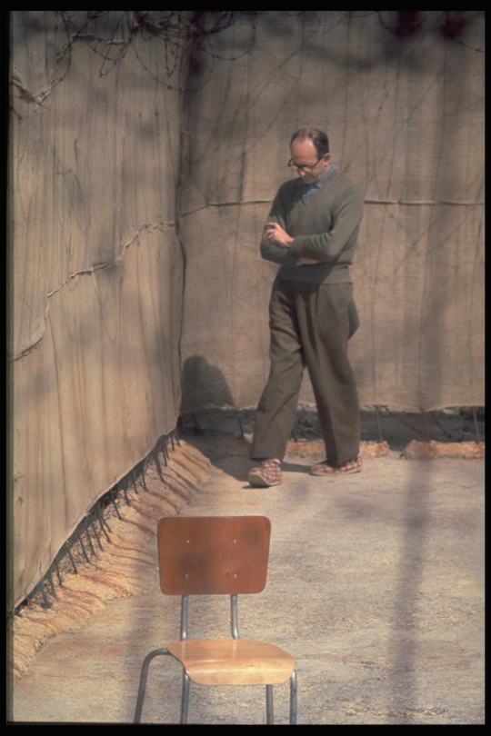 Adolf Eichmann paces in the yard of his cell in Ramle Prison, Israel, April 21, 1961(Photo: John Milli/GPO)