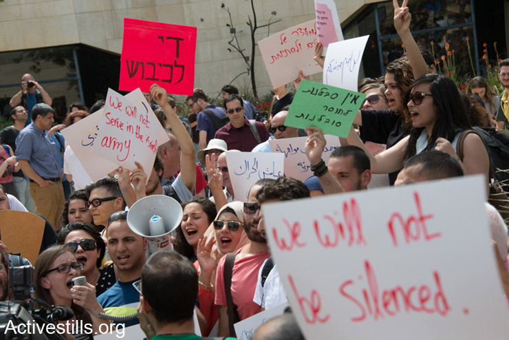 Hebrew University students and faculty hold a demonstration in solidarity with Palestinian Christian citizens of Israel who were recently sent “voluntary draft” notices encouraging them to enlist in the Israeli military, East Jerusalem, May 7, 2014. Though army service will remain voluntary for non-Jewish Israelis, the move is seen as an attempt to drive a wedge between Palestinian Christian and Muslim citizens of Israel.