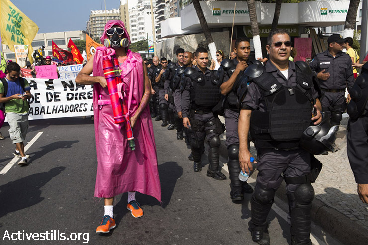 Activists take part in a demonstration against the World Cup also marking 45 years to since the Stonewall Inn riots, Rio de Janeiro, Brazil, June 28, 2014. (Keren Manor/Activestills.org)