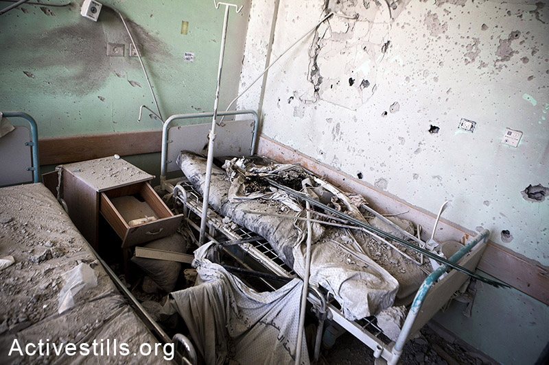Damage is seen inside the Al Aqsa hospital following an Israeli attack, Deir al-Balah, in central Gaza., July 27, 2014.  The direct attack, which took place on 21 July, killed at least 5 Palestinians and injured 70. Israeli attacks have killed more than 1,000 Palestinians and injured around 5,000 in the current offensive.