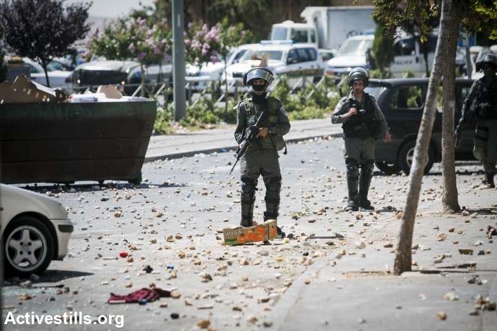 Israeli forces seen during a protest following the suspected kidnapping and murder of a Palestinian teenager, East Jerusalem, July 2, 2014. (Photo by Yotam Ronen/Activestills.org)