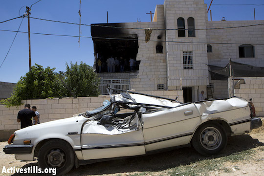 The damaged family home of Amer Abu Aisheh, one of two Palestinians identified by Israel as suspects in the killing of three Israeli teenagers, after it was damaged by the Israeli army in the West Bank city of Hebron, Tuesday, July 1, 2014. Abu Aisheh has not been arrested by security forces have been searching for him since the kidnappings, his family says. (Photo by Activestills.org)