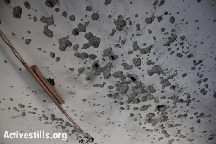 A ceiling in the family home of Zakaria al-Aqra, age 24, who was killed by Israeli forces seen in the West Bank village of Qabalan, Nablus, August 11, 2014.