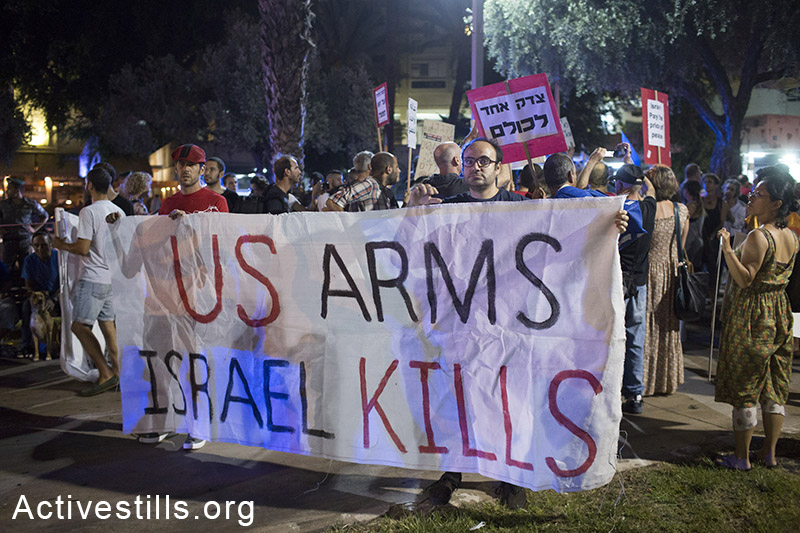 Israeli activists protest in centre Tel Aviv against the Israeli attack on Gaza, calling to end the violence, August 23, 2014.(Activestills.org)