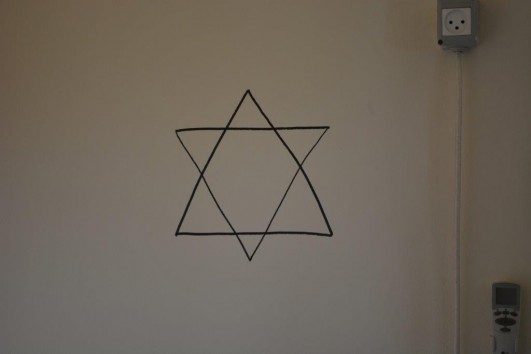 A Star of David scribbled on the wall of a Palestinian home used as a military post by Israeli soldiers during Operation Protective Edge, the Gaza Strip, August 2014. (photo: Alexandr Nabokov)