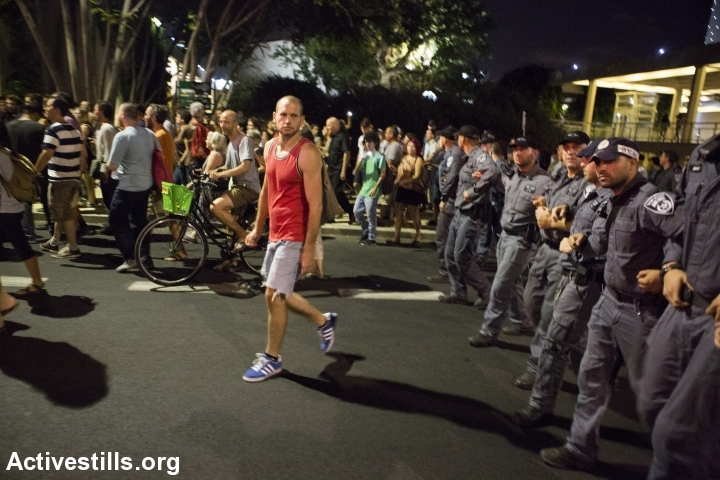 Left-wing demonstrators march through central Tel Aviv after being barred from holding their anti-war demonstration at Habima Square. (photo: Keren Manor/Activestills.org)