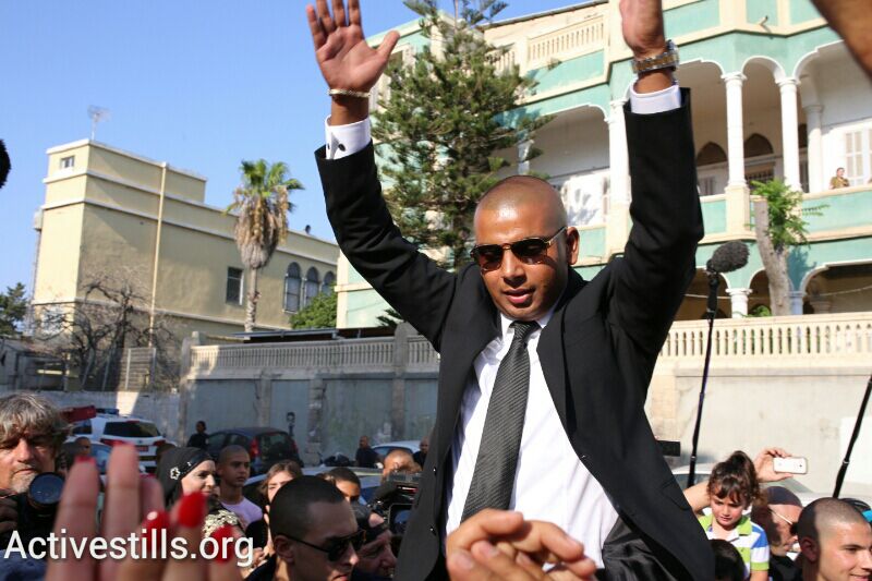 Mahmoud Mansour celebrates in Jaffa before heading to out to his wedding reception. (photo: Yotam Ronen/Activestills.org)