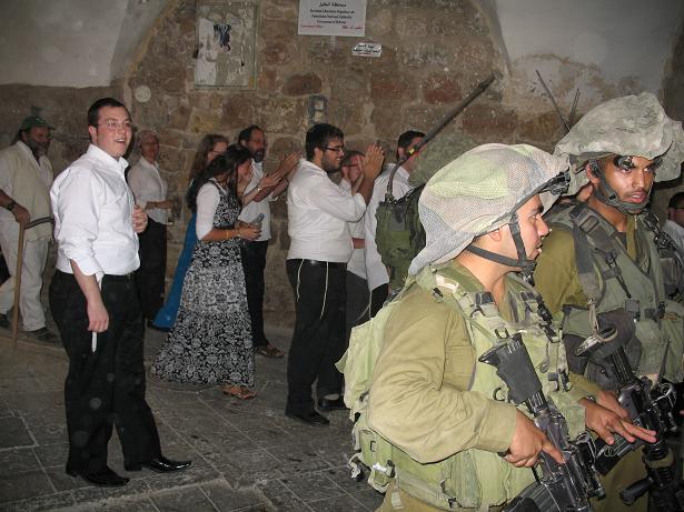 Settlers in Hebron During the Weekly Protest to Open Shudada Street. Photo by Ayala Shani  