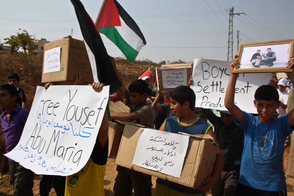 Palestinian Children Call for a Boycott of Settlement Products During Beit Umar Demonstration. Photo Credit: Joseph Dana.