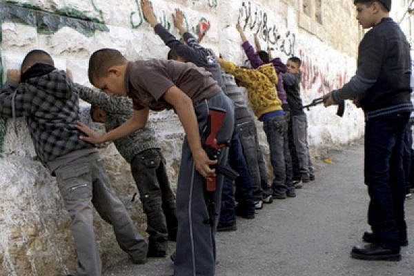 E. Jerusalem children imitating Israeli soldiers (photo: Atta Awisat)