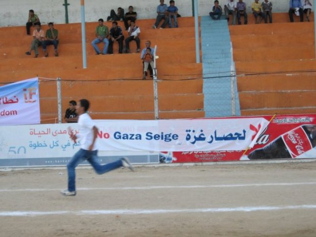 12-hour-long relay race in Yarmouk stadium, Gaza (by Jared Malsin)