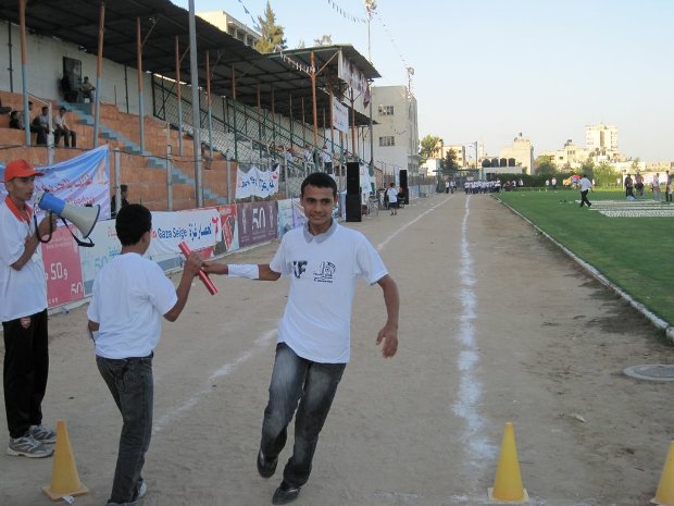 12-hour-long relay race in Yarmouk stadium, Gaza (by Jared Malsin)