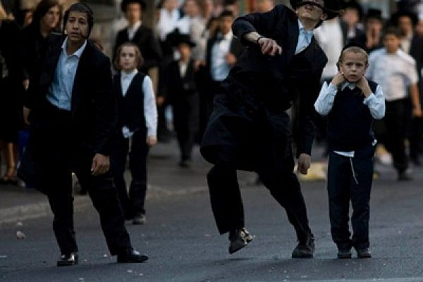 Ultra-Orthodox protesting the opening of a parking lot in Jerusalem (photo: Oren Ziv/activestills.org)