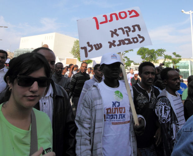 Refugees march in the Human Rights March, 2010