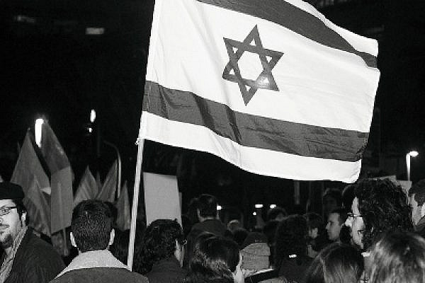 Can this flag stand for all its citizens or only the Jewish ones? Photo: Yossi Gurvitz