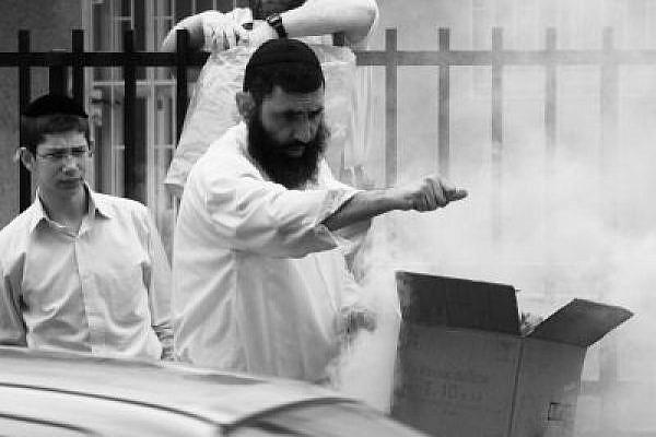 Jewish brotherhood burning of bread ritual carried out in public (Yossi Gurvitz)