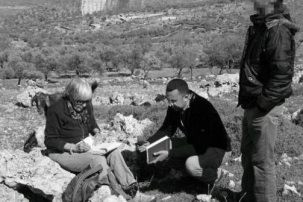 A Yesh Din team collecting testimony in Kusra (Photo: Yossi Gurvitz)