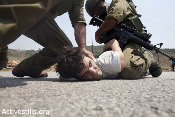 One of the detained Israeli activists. Photo by Oren Ziv/ activestills.org