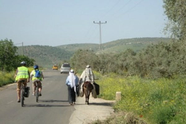 Riding through the West Bank (Photo: Olivia Snaije)