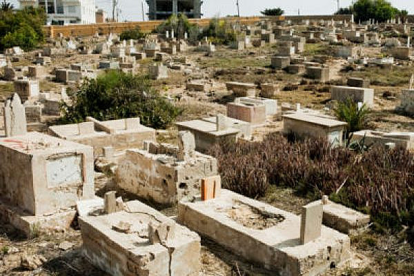 Graves desecrated in Jaffa in a "price tag" attack. (Photo: Activestills)