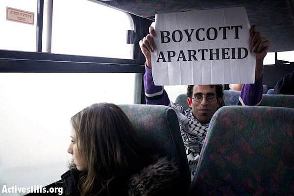 Basel al-Araj, a Palestinian who was killed during a gunfight with Israeli soldiers on March 6, 2017, is seen in November 2011 during a Freedom Ride on a settler-only bus in the West Bank. (Activestills.org)