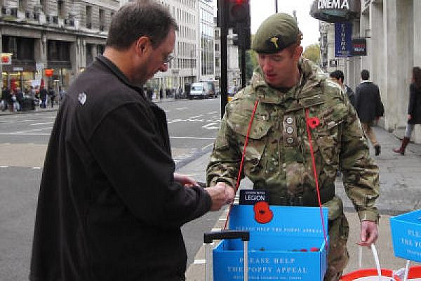 Soldiers distribute poppies in London, Novemeber 2011. (Photo: Yossi Gurvitz)