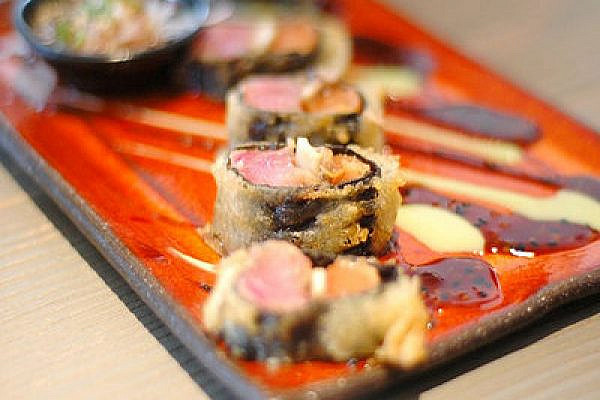 Sushi tray in Israel (Flickr/cc: EyalNow)