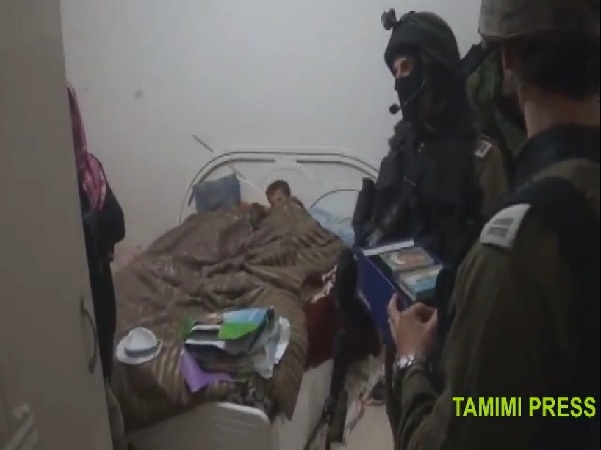 Soldiers in a children's bedroom in Nabi Saleh (from a video by Bilal Tamimi)