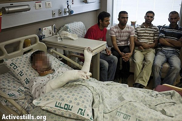 Palestinian injured in firebomb attack in West Bank August 17 2012 (Activestills)