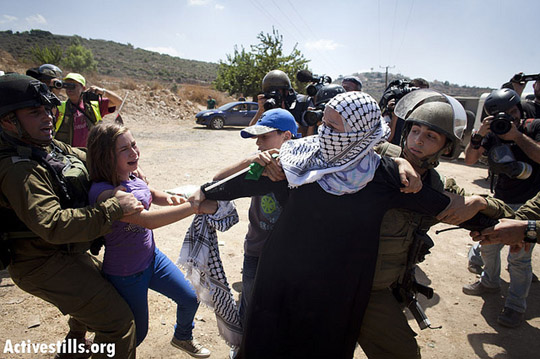 PHOTOS: Israeli forces crack down on weekly protest in Nabi Saleh 