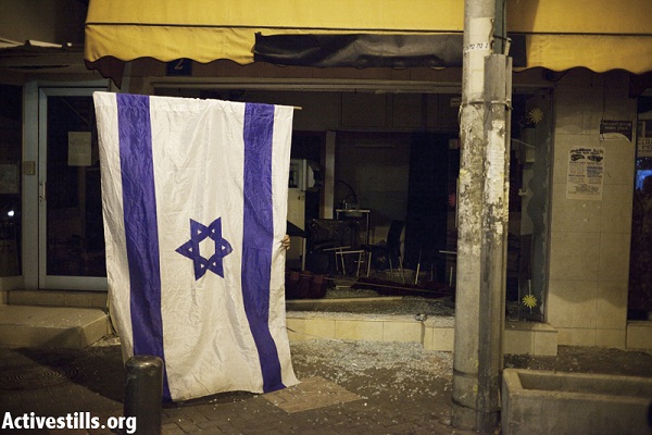 An Ethiopian bar attacked by a mob after a protest against African refugees and asylum seekers in Tel Aviv's Hatikva neighborhood on May 23, 2012. (Photo: Activestills)