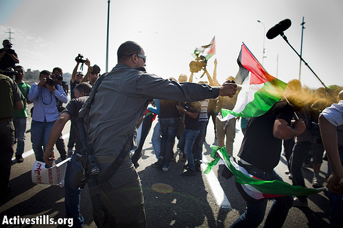 Photos: Palestinians block Route 443 to protest settler violence