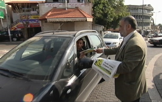 Volunteer from one of the Arab parties canvasing potential voters in Nazareth, Israel, January 2013 (photo: GS)