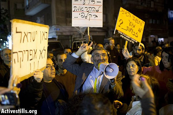 Knesset member MK Micheal Ben Ari shouting slogans during an anti-immigrant demonstration, organized by members of his political party as part of their election campaign, in South Tel Aviv on December 31, 2012. (Photo by: Oren Ziv/ Activestills.org)