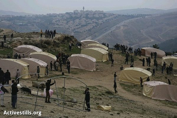 A Palestinian tent city being constructed by the Popular Committees in the E1 area, January 11, 2013. The camp holds approximately 25 tents, and is called by the activists "Bab al-Shams" village. (photo: Oren Ziv/Activestills)