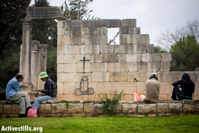 Signs telling the Palestinian history of Bir'em were removed by authorities (Oren Ziv / Activestills)