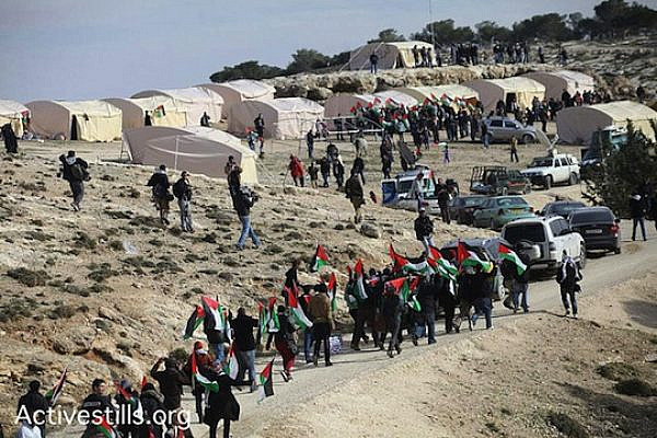 Palestinian activists arrive at the "Bab Al Shams" camp, E1 area, January 12, 2013. (photo: Yotam Ronen/Activestills)