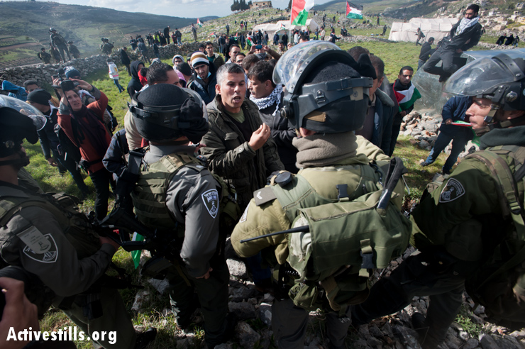 Photos: Israeli forces attack Palestinian protest village 