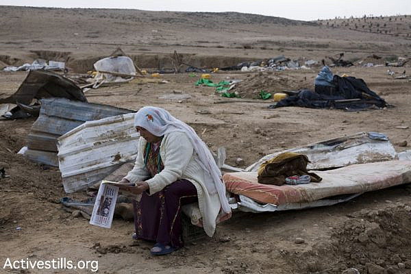 A Bedouin woman after authorities demolished her village of Al Araqib, January 16, 2011 (Keren Manor/Activestills.org)