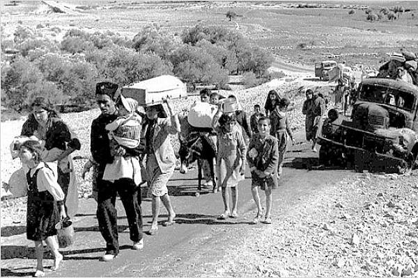Palestinian refugees 'making their way from Galilee in October-November 1948' (Fred Csasznik, copyright expired)